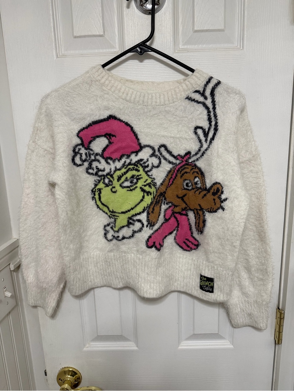 The Grinch x Justice Cozy White Holiday Sweater with Character Graphic